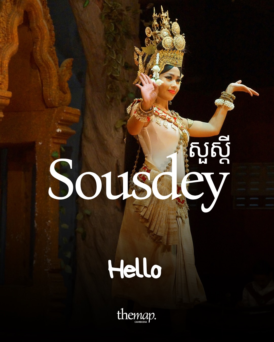 Le mot khmer Sousdey signifiant bonjour, affiché sur une danseuse classique cambodgienne en blanc levant la main